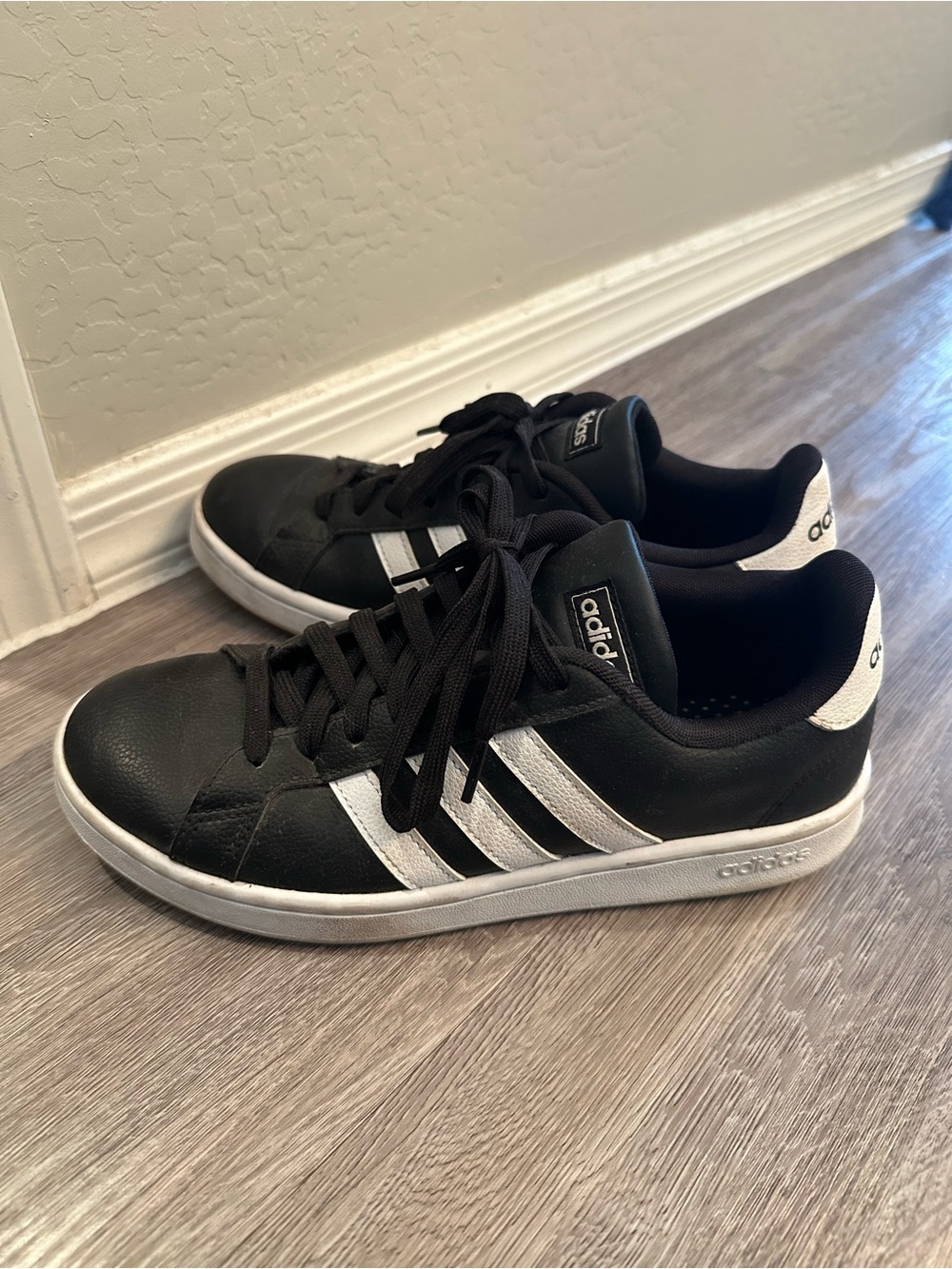 Adidas Women’s Black & White Leather Sneakers